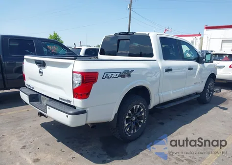 2018 Nissan Titan Pro-4X from USA, damaged, VIN 1N6AA1E54JN551139